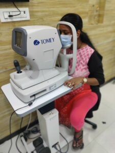 Patient is performing Corneal Topography Test